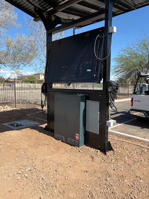 Electrical equipment behind a commercial EV charging station.