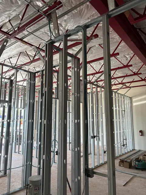 Electrical rough-in for new tenant partitions.