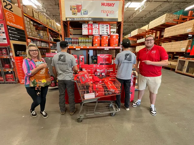 Gray Electric team members at a supply store.