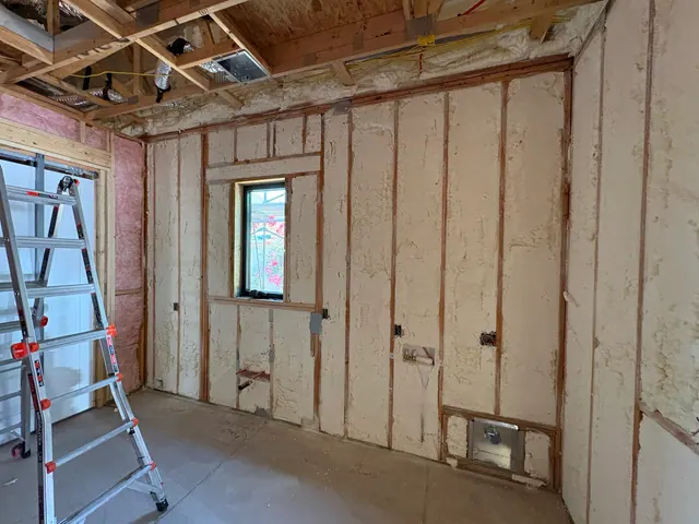 Laundry and utility circuit rough-in before wall finishes.