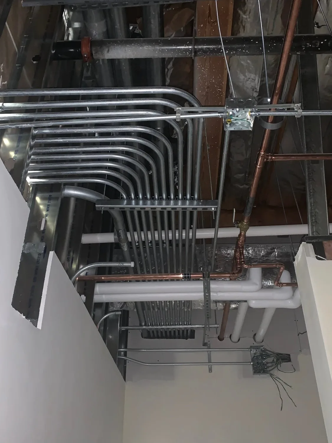 Conduit runs on a commercial rough in by Gray Electric