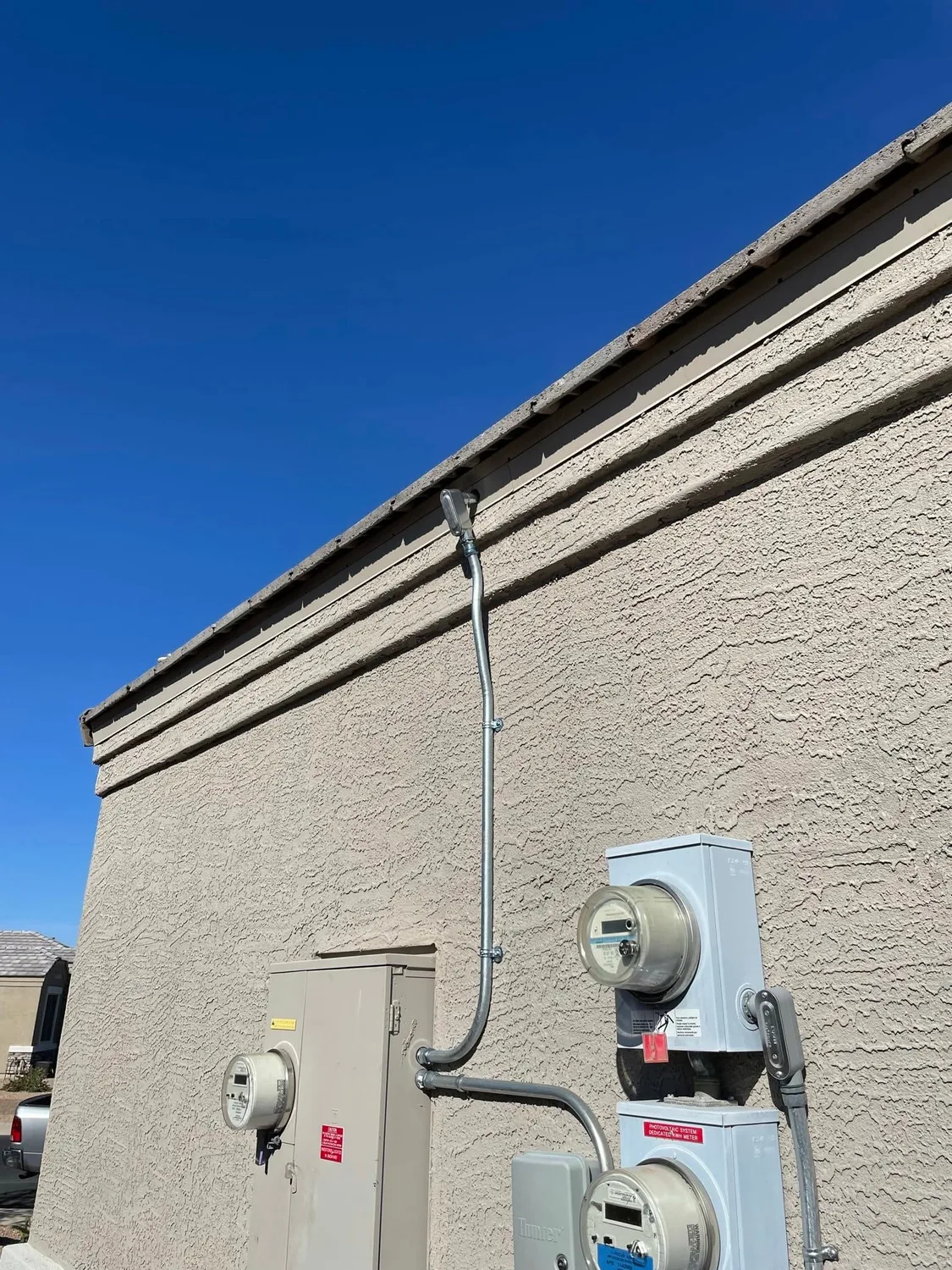 Clean meter and service work on a home exterior