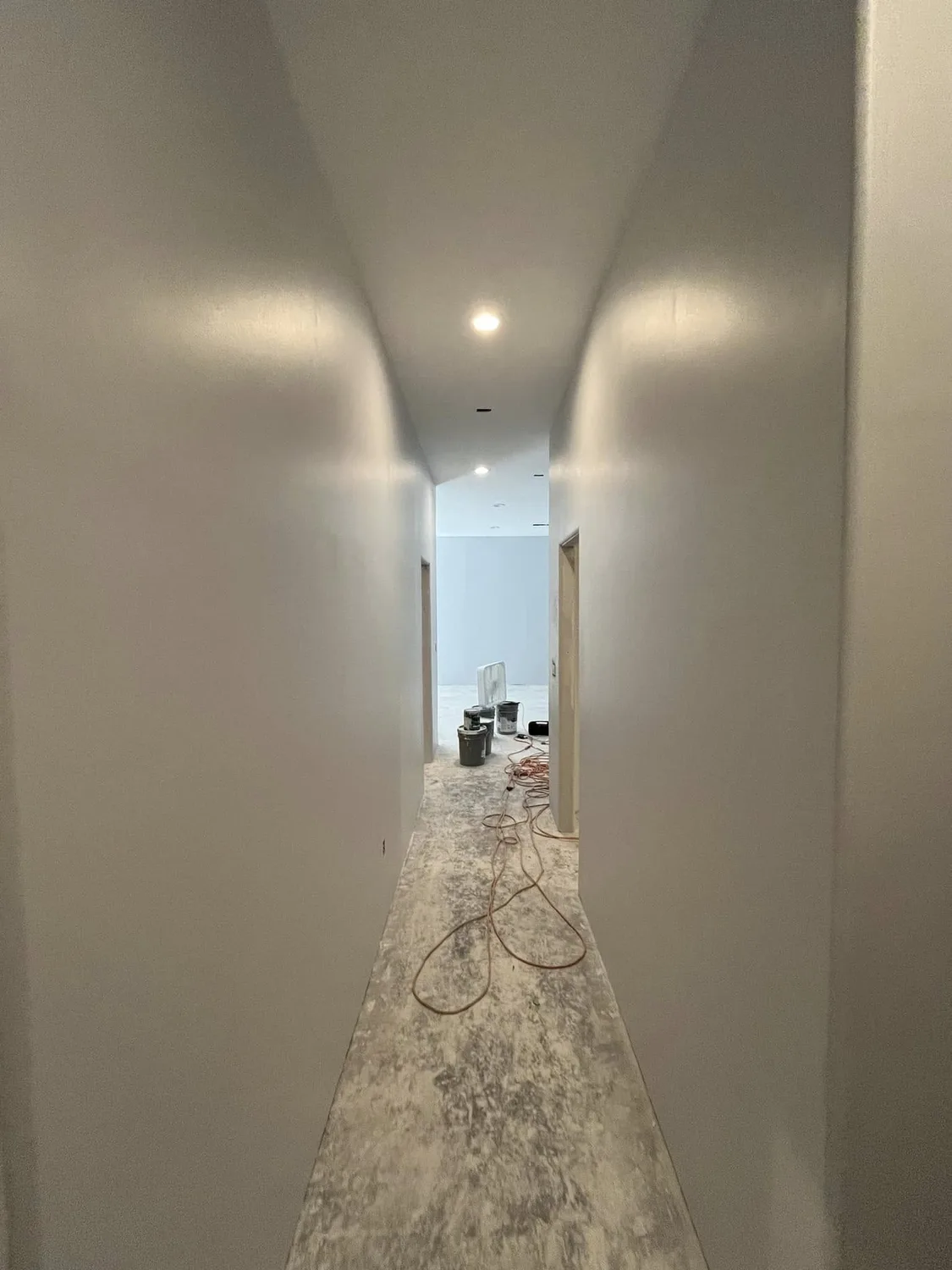 Recessed can lighting installed in a ceiling by Gray Electric
